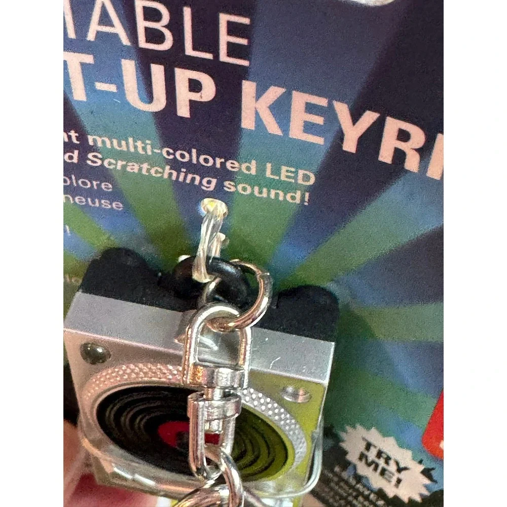 Kikkerland Turntable Light-Up Keyring Silver DJ Record Untested
